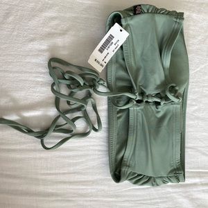 Brand new swim top strapless cross cross back